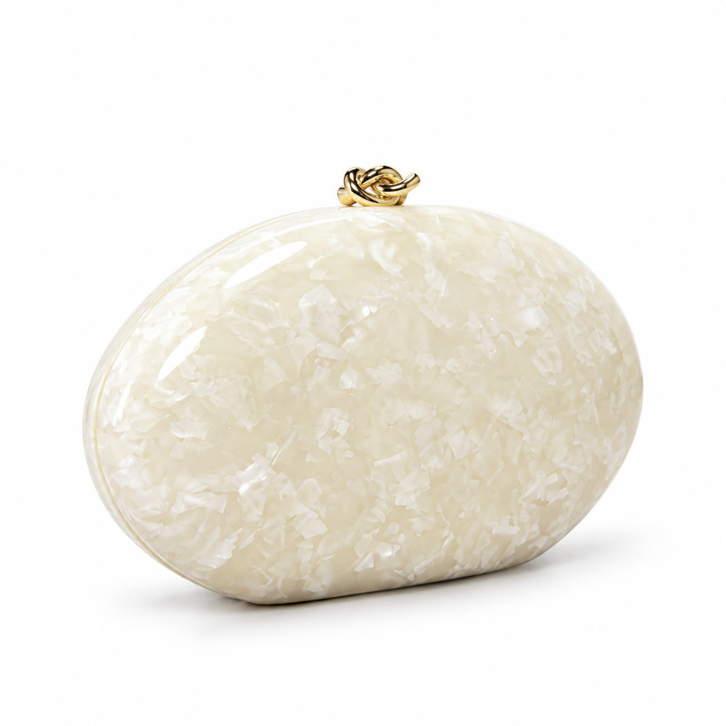 The Golden Twist Shell Clutch