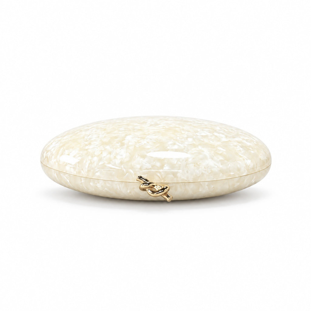 The Golden Twist Shell Clutch
